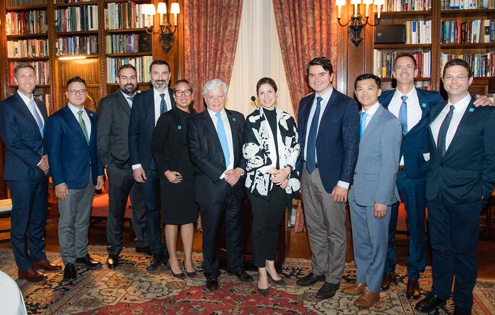 Group photo of Dr. Thomas Sculco and others at the 2019 Biofilm Symposium