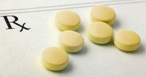 Yellow pill tablets.