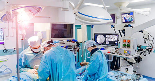 Spine surgeons in the operating room.