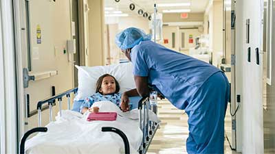 hospital worker with child