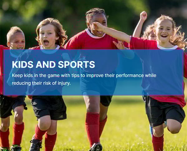 Children in soccer uniforms running.