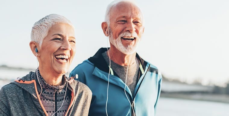 smiling older man and woman