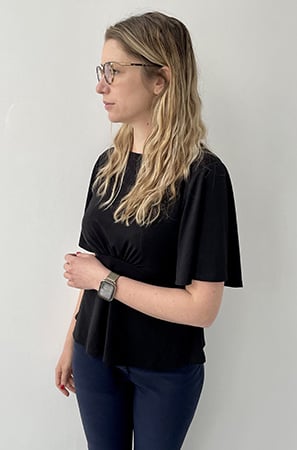 Image of a woman twisting her torso to her right