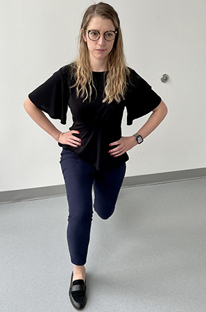 Image of a woman lunging with her right leg forward