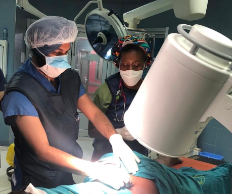 Dr. Harman Singh teaches the fellows fluoroscopy-guided epidural steroid injections