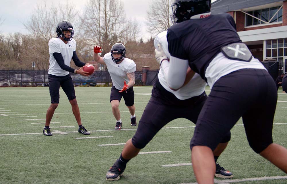 Young football players training